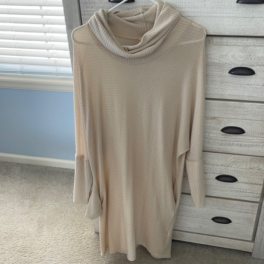Malik cream color dress. Size Medium Stretches. So may even fit a large.